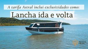 a boat in the water with the wordsianeida islandortholisolis at Pousada Astral da Ilha in Ilha do Mel