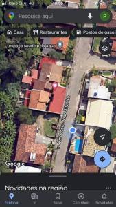 een uitzicht over de straat met huizen en gebouwen bij Sobradinho Morro das Pedras in Florianópolis