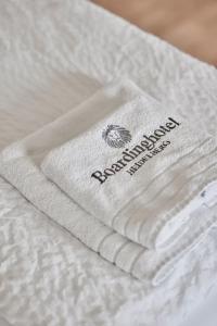 Ein Zertifikat, Auszeichnung, Logo oder anderes Dokument, das in der Unterkunft Boardinghotel Heidelberg ausgestellt ist