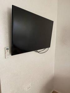 TV a/nebo společenská místnost v ubytování Centre-Ville & Confort Absolu