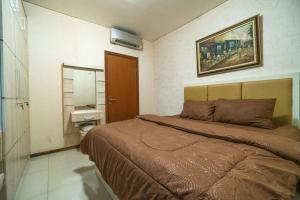 Postel nebo postele na pokoji v ubytování Comfy & Modern 1BR At Central