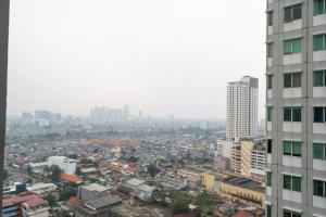 Nespecifikovaný výhled na destinaci Jakarta nebo výhled na město při pohledu z apartmánu