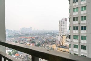 Nespecifikovaný výhled na destinaci Jakarta nebo výhled na město při pohledu z apartmánu