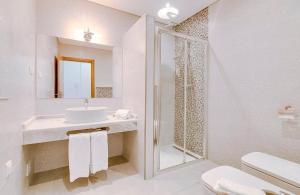Um banheiro em Apartamentos Sol & Ria