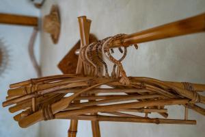 a close up of a wicker chair at Villa Burung Gili Air Authentic 3-Bedroom Bamboo Villa with Private Pool in Gili Air