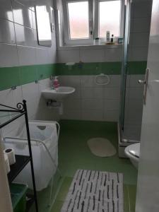Vonios kambarys apgyvendinimo įstaigoje Apartments by the sea Novalja, Pag - 21646