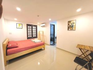 Ein Bett oder Betten in einem Zimmer der Unterkunft KENPI Homestay