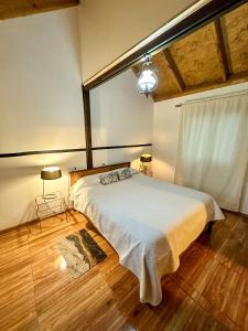 Ένα ή περισσότερα κρεβάτια σε δωμάτιο στο Molco Cabins Bosque