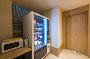 Kuchyň nebo kuchyňský kout v ubytování Hotel Aria
