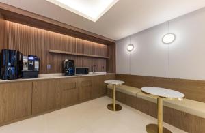 Kuchyň nebo kuchyňský kout v ubytování Hotel Aria