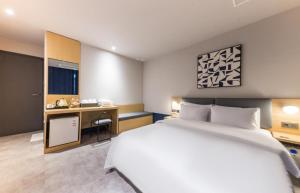Postel nebo postele na pokoji v ubytování Hotel Aria