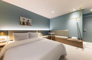 Postel nebo postele na pokoji v ubytování Hotel Aria