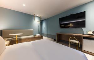 Postel nebo postele na pokoji v ubytování Hotel Aria
