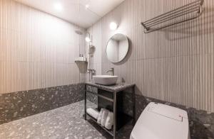 Koupelna v ubytování Hotel Aria