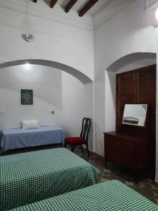 Postel nebo postele na pokoji v ubytování Heritage Home, Hampe's