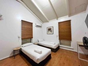 Ένα ή περισσότερα κρεβάτια σε δωμάτιο στο Group house with views of the salt pool and spa