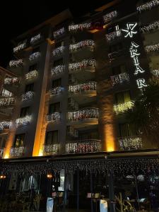 a building with a lot of lights on it at Aria Riva Apart Hotel in Alanya