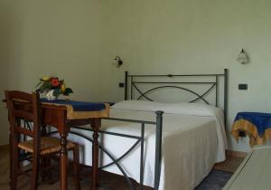 Кровать или кровати в номере Agriturismo Cavallin Del Bufalo