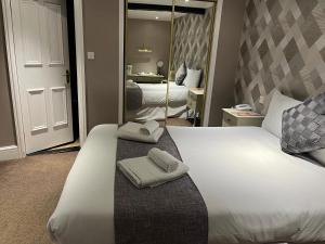 Кровать или кровати в номере Limes hotel