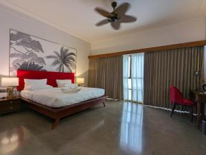 Prasanthi Hotel客房内的一张或多张床位