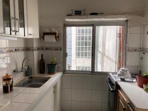 Kuchyň nebo kuchyňský kout v ubytování Edificio Quijano