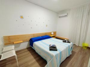 Postel nebo postele na pokoji v ubytování Casa Cristina