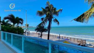 a view of the beach from the balcony at Ponta Negra Beach beira-mar in Natal