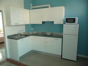 Virtuvė arba virtuvėlė apgyvendinimo įstaigoje Soggiorno Aurora