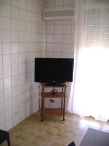 TV a/nebo společenská místnost v ubytování Torrebianca
