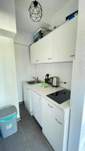 Virtuvė arba virtuvėlė apgyvendinimo įstaigoje Air Apartments 11
