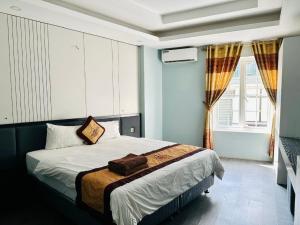 Voodi või voodid majutusasutuse Hanoi Central Backpackers Hostel toas