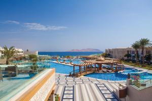 a view of a resort with a swimming pool at Sunrise Arabian Beach Resort in Sharm El Sheikh
