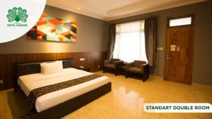 Cama o camas de una habitación en Hotel Cianjur Cipanas