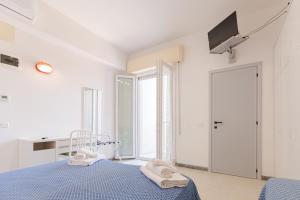 TV a/nebo společenská místnost v ubytování Hotel Altamarea