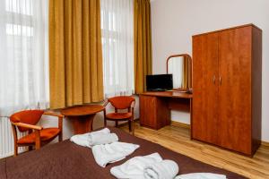 Postel nebo postele na pokoji v ubytování Villa Antares I & II
