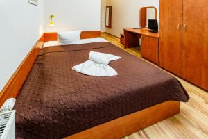 Postel nebo postele na pokoji v ubytování Villa Antares I & II