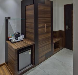 Kuchyň nebo kuchyňský kout v ubytování Grand Continent Hosur A Sarovar Portico Affiliate Hotel