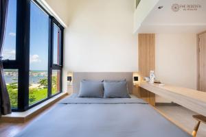Кровать или кровати в номере The Rebirth Apartment Binh Chau Ho Tram