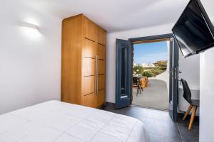 Postel nebo postele na pokoji v ubytování Elea Resort - Adults Only + 37 fotografií