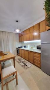 A kitchen or kitchenette at TravellerSpot_II cozy 2br apt