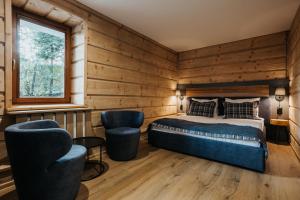 Posteľ alebo postele v izbe v ubytovaní New Apartamenty Jan