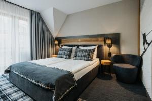 Posteľ alebo postele v izbe v ubytovaní New Apartamenty Jan