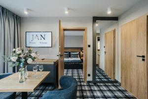 Posteľ alebo postele v izbe v ubytovaní New Apartamenty Jan
