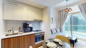 Kuchyň nebo kuchyňský kout v ubytování Primestay - Business Bay, Vera Residences