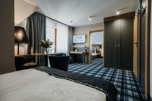 Posteľ alebo postele v izbe v ubytovaní New Apartamenty Jan