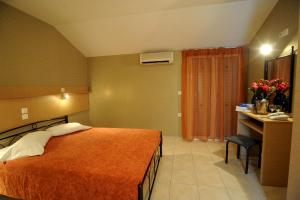 Postel nebo postele na pokoji v ubytování Maria Hotel