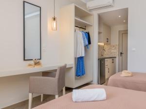 Postel nebo postele na pokoji v ubytování Maria Hotel