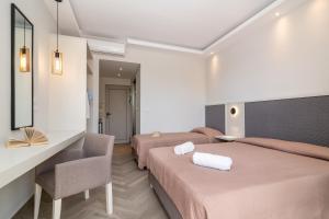 Postel nebo postele na pokoji v ubytování Maria Hotel