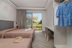 Postel nebo postele na pokoji v ubytování Maria Hotel