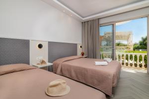 Postel nebo postele na pokoji v ubytování Maria Hotel